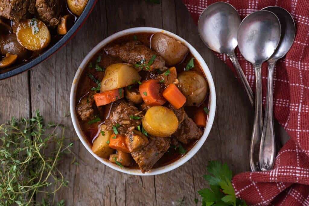 This Dutch Oven Beef Stew recipe is the perfect comfort food for a cold winter’s night! Made with tender stew beef, potatoes, carrots and mushrooms it is a hearty dinner that the everyone will love.