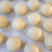 Homemade dark chocolate truffles with white chocolate coating