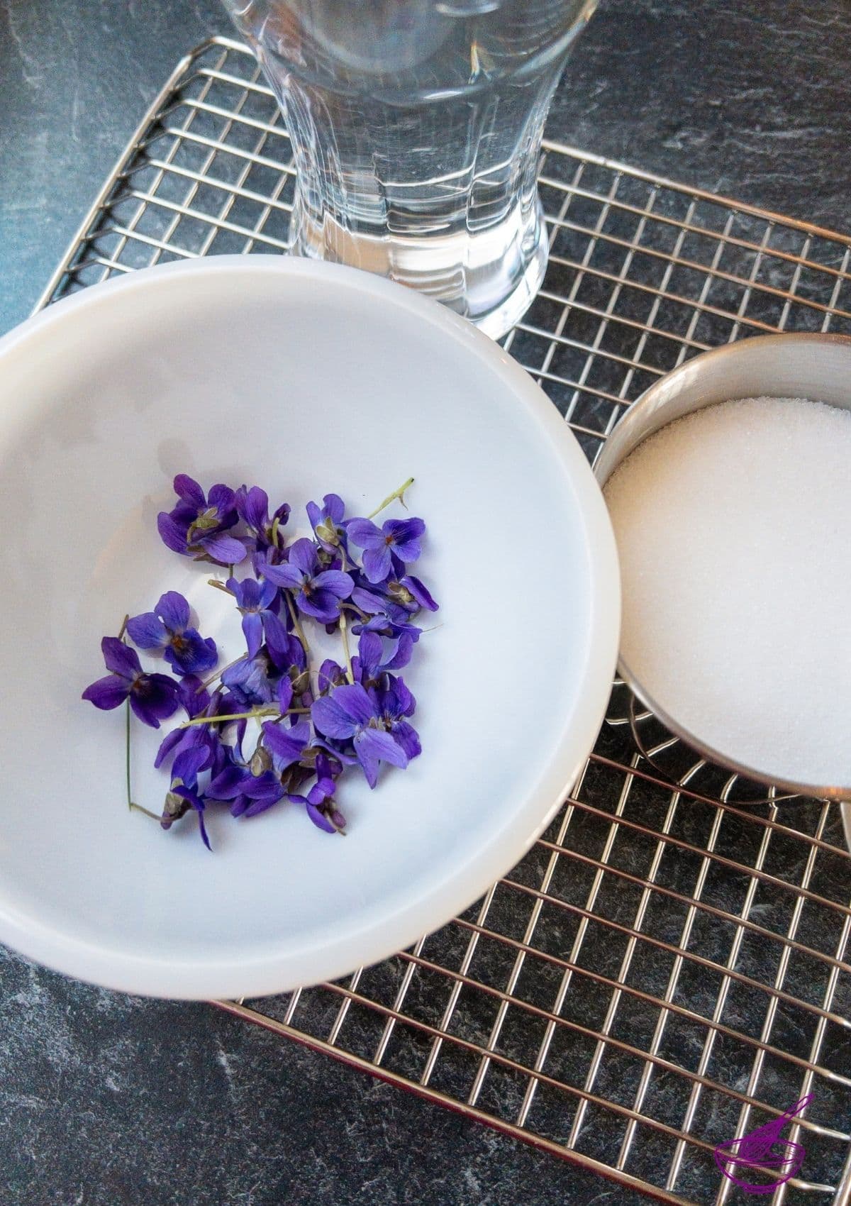 Fresh violets, superfine sugar, and water