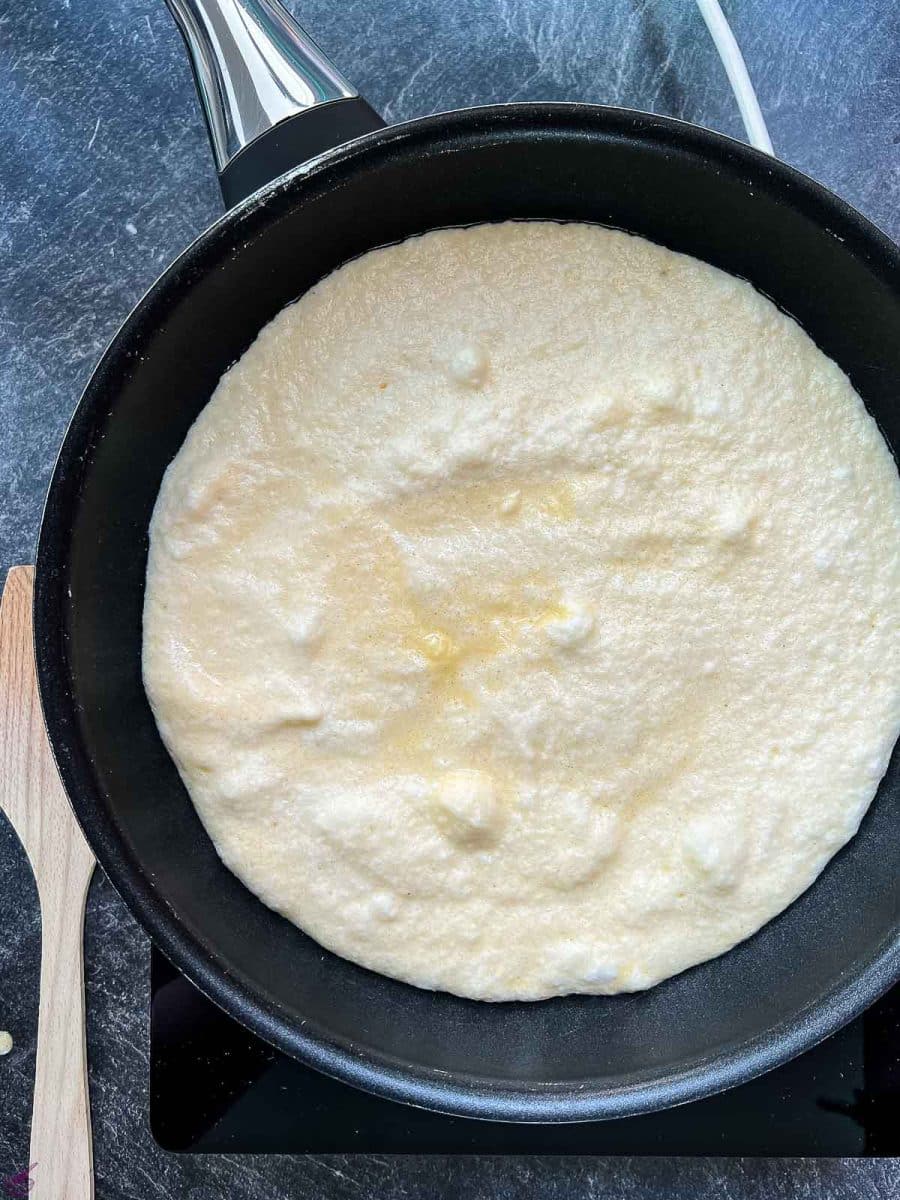 Fry the dough in a hot pan.