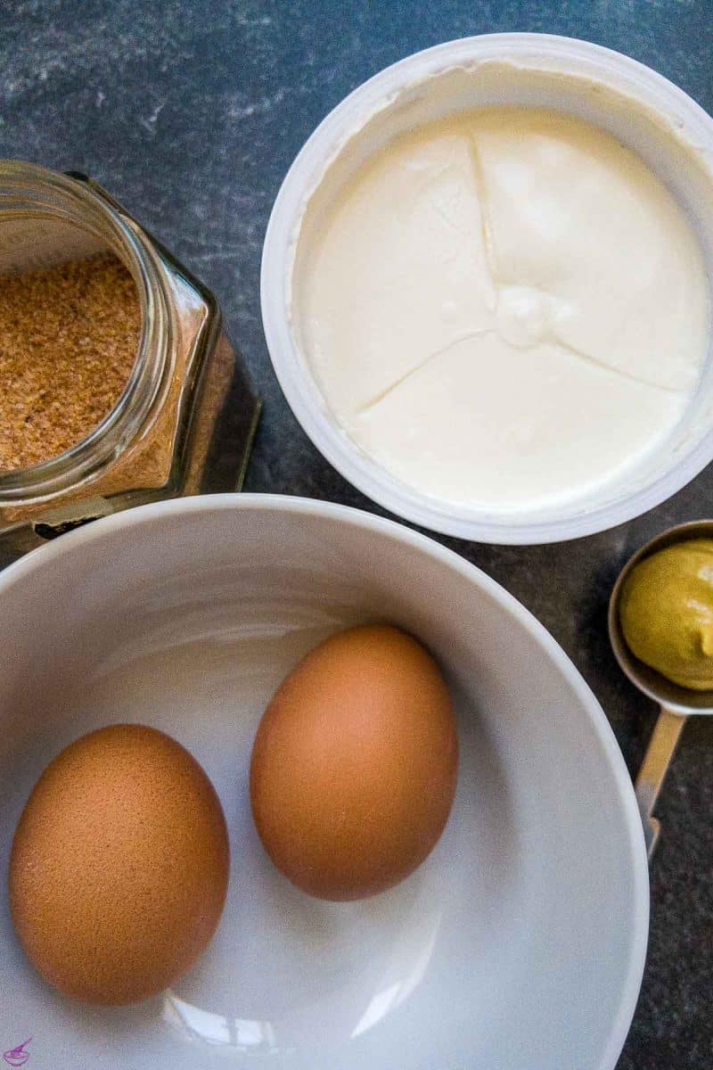 Four ingredients for an easy egg salad spread.