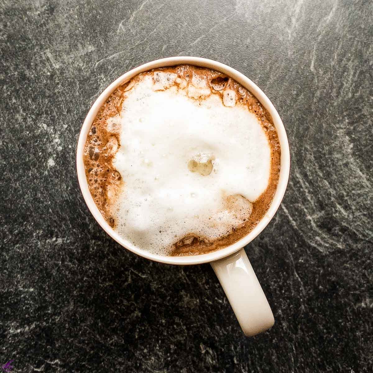 Hot chocolate topped with milk foam.