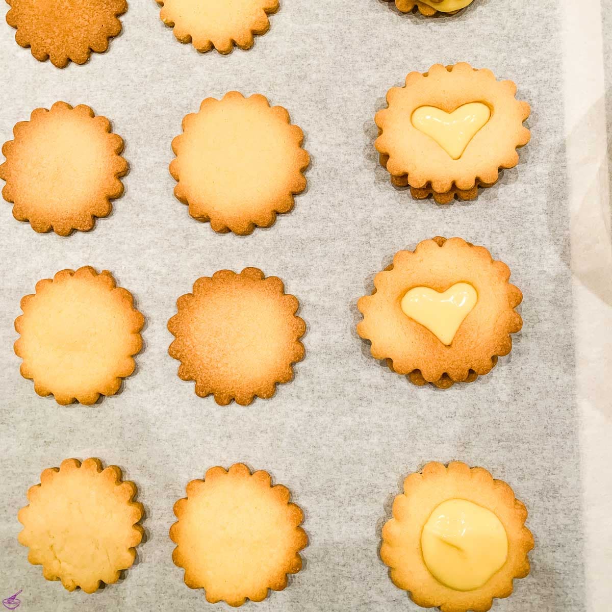 ready to eat Linzer Cookies with homemade Egg Liqueur