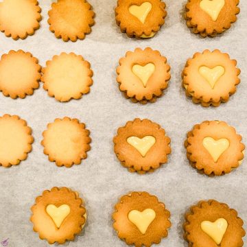 ready to eat Linzer Cookies with homemade Egg Liqueur