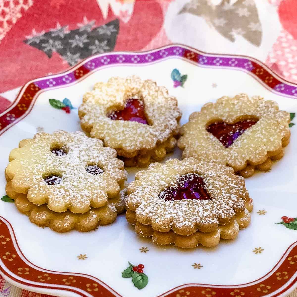 Traditional Linzer cookies filled with raspberry jam.