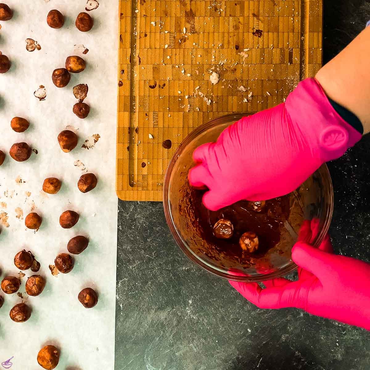 Roll the marzipan balls through a tad of melted chocolate until they look dull and dry.