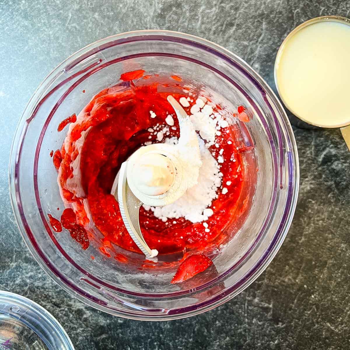 Combine the strawberries with the powdered sugar.