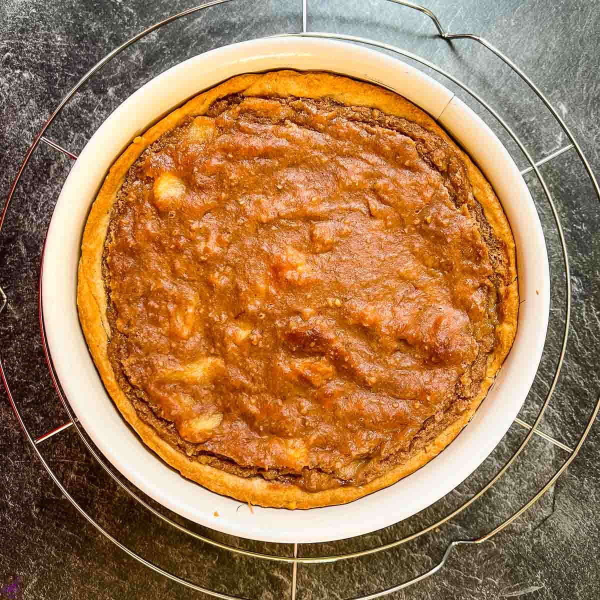 The tart is ready when the surface of the custard starts to turn golden brown.