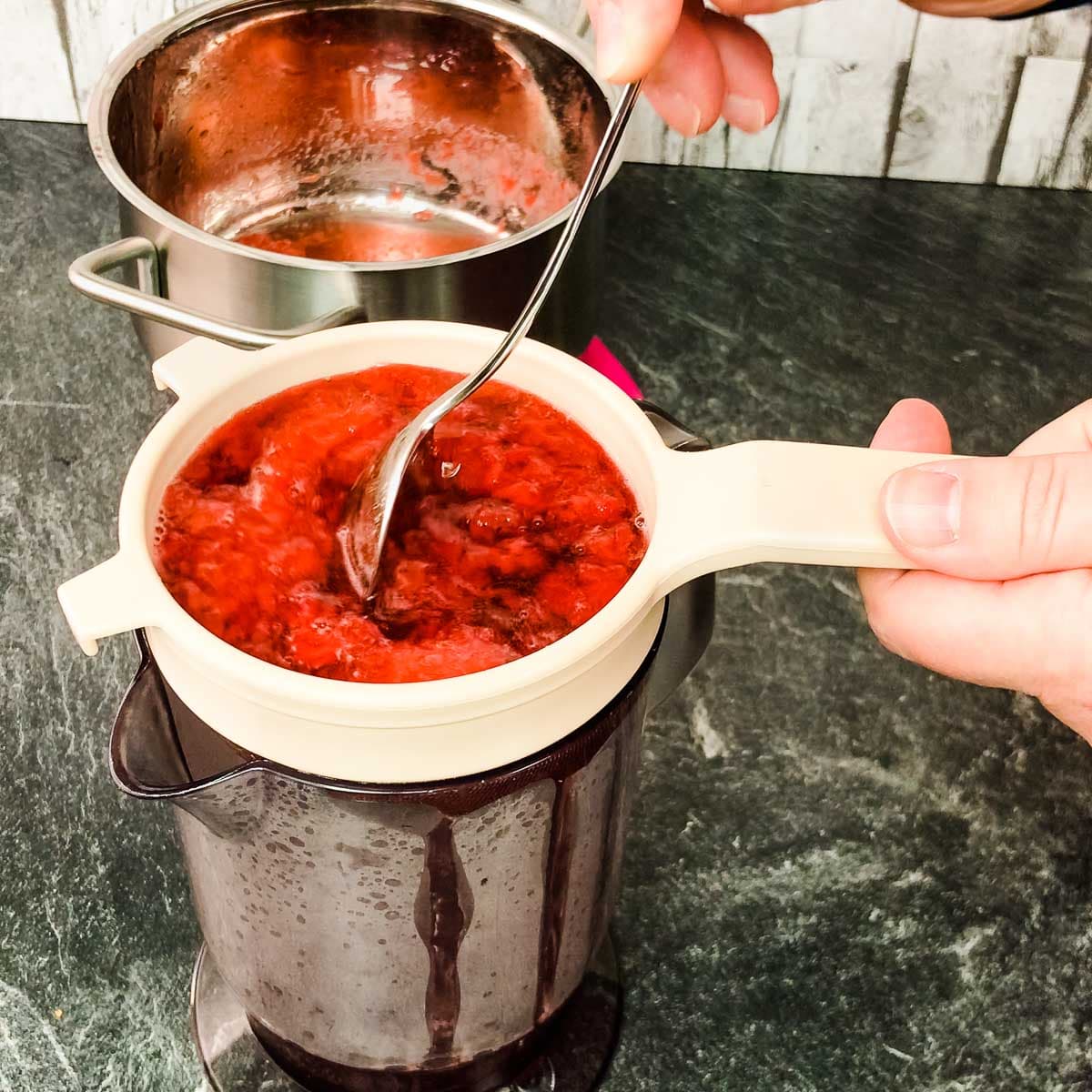 Strain the strawberry mixture through a fine mesh sieve.