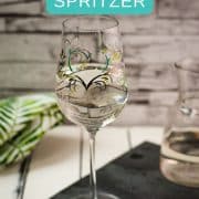 A gorgeous glass filled with a refreshing white wine spritzer! Enjoy!