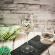 A gorgeous glass filled with a refreshing white wine spritzer! Enjoy!