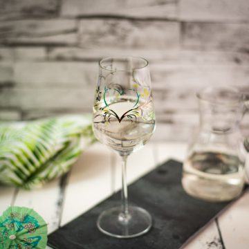 A gorgeous glass filled with a refreshing white wine spritzer! Enjoy!