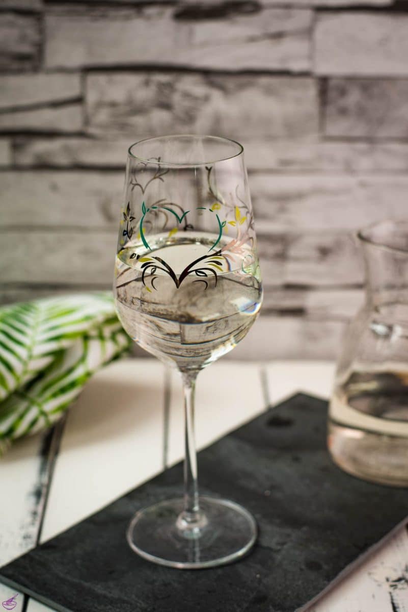 A gorgeous glass filled with a refreshing white wine spritzer! Enjoy!