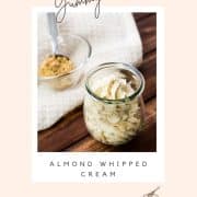 Almond whipped cream piped in a gorgeous Weck Jar on a wooden ground.