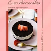 Mini no-bake Oreo cheesecake on a pink plate decorated with sliced strawberries.