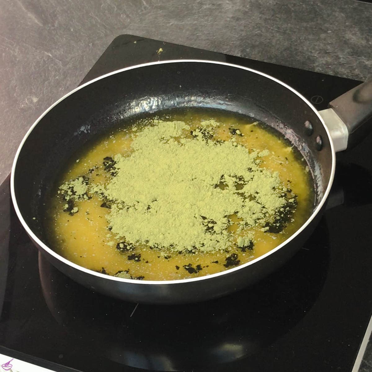 Add the Matcha powder to the melted butter.