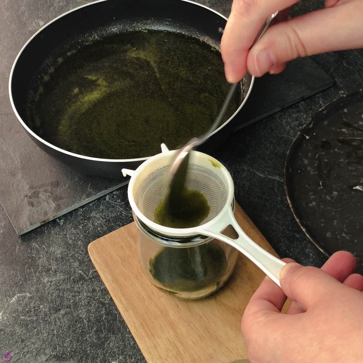 Sieve the Matcha infused butter through a close-meshed sieve.