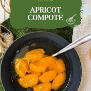 Black bowl filled with a healthy and delicious apricot compote.