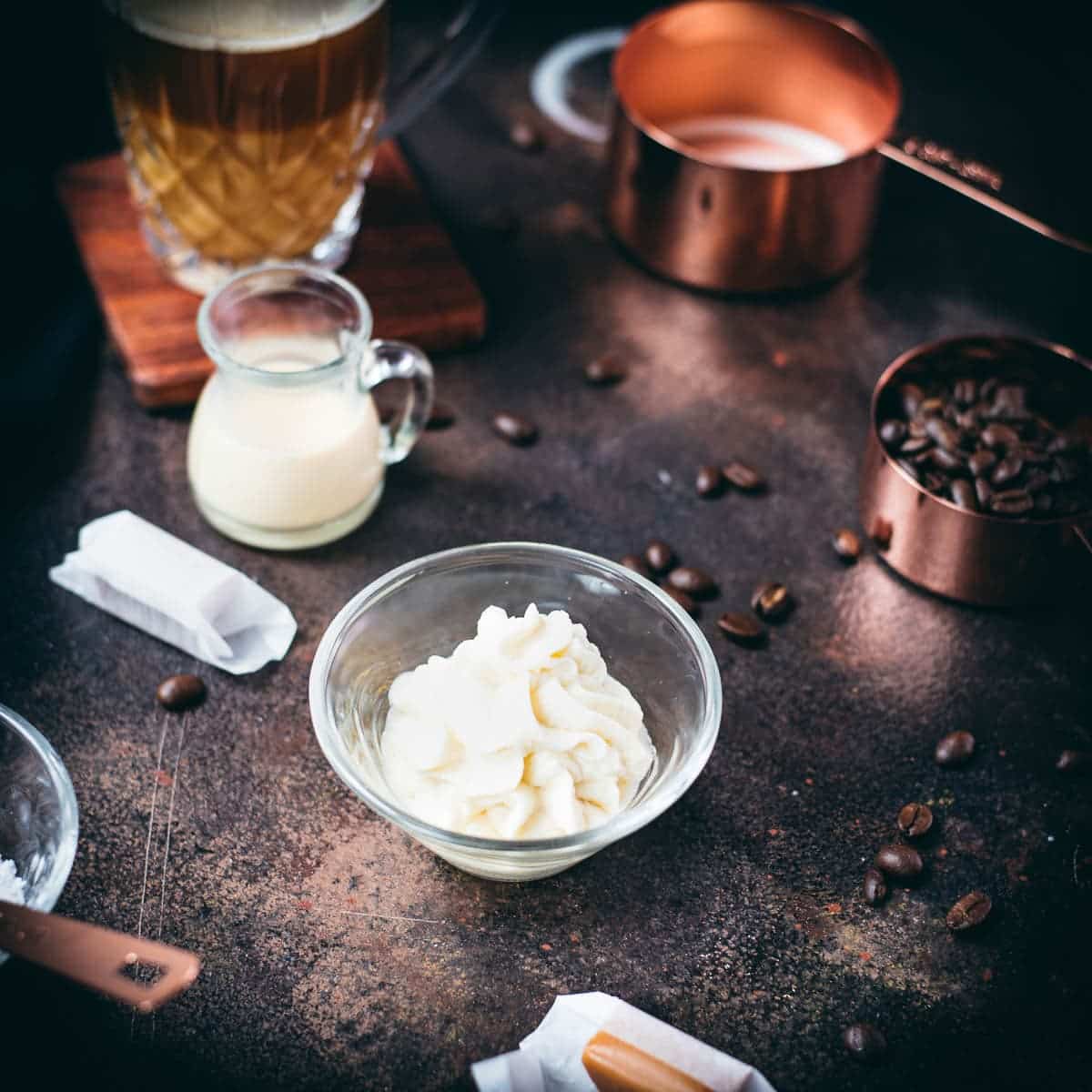 Glass bowl filled with whipped coffee creamer.