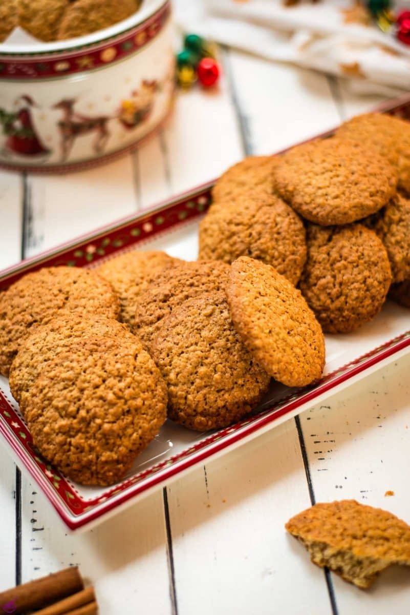 Oatmeal cinnamon cookies placed on Christmas plate.