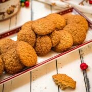 Oatmeal cinnamon cookies placed on Christmas plate.