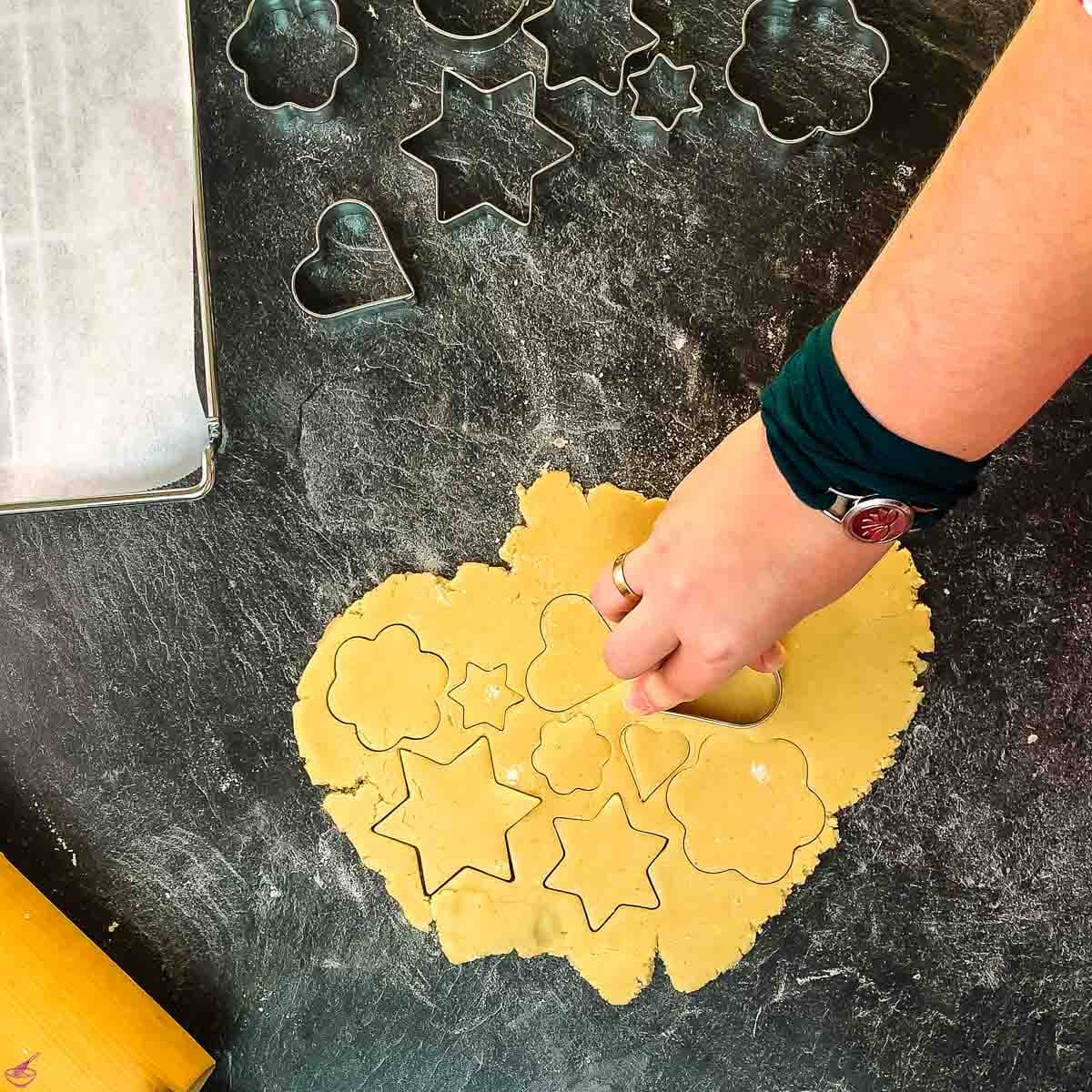 Punch out the sugar cookies using different cookie cutter.