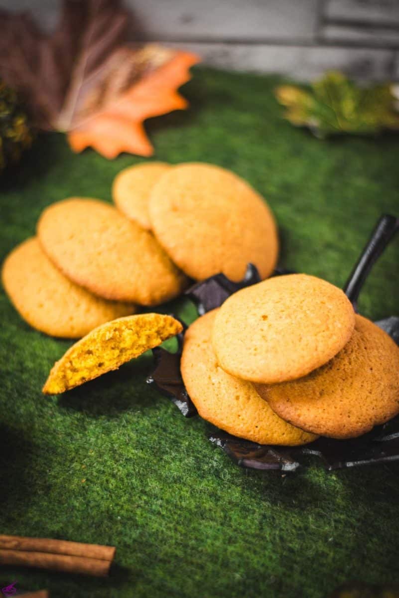 Super soft and delicious pumpkin cookies placed on black leaf shaped dish.