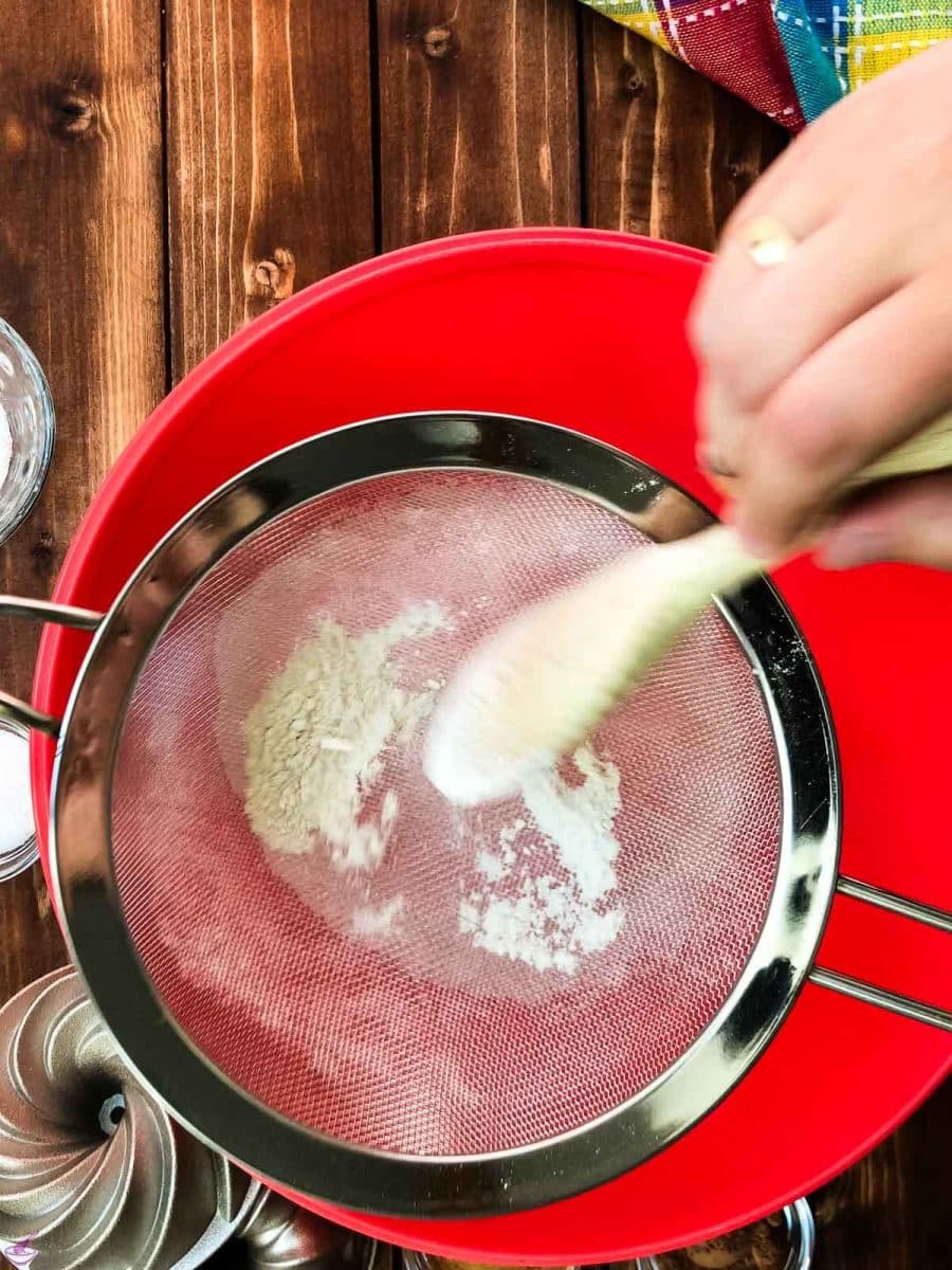 Sieve the flour through a close meshed sieve.