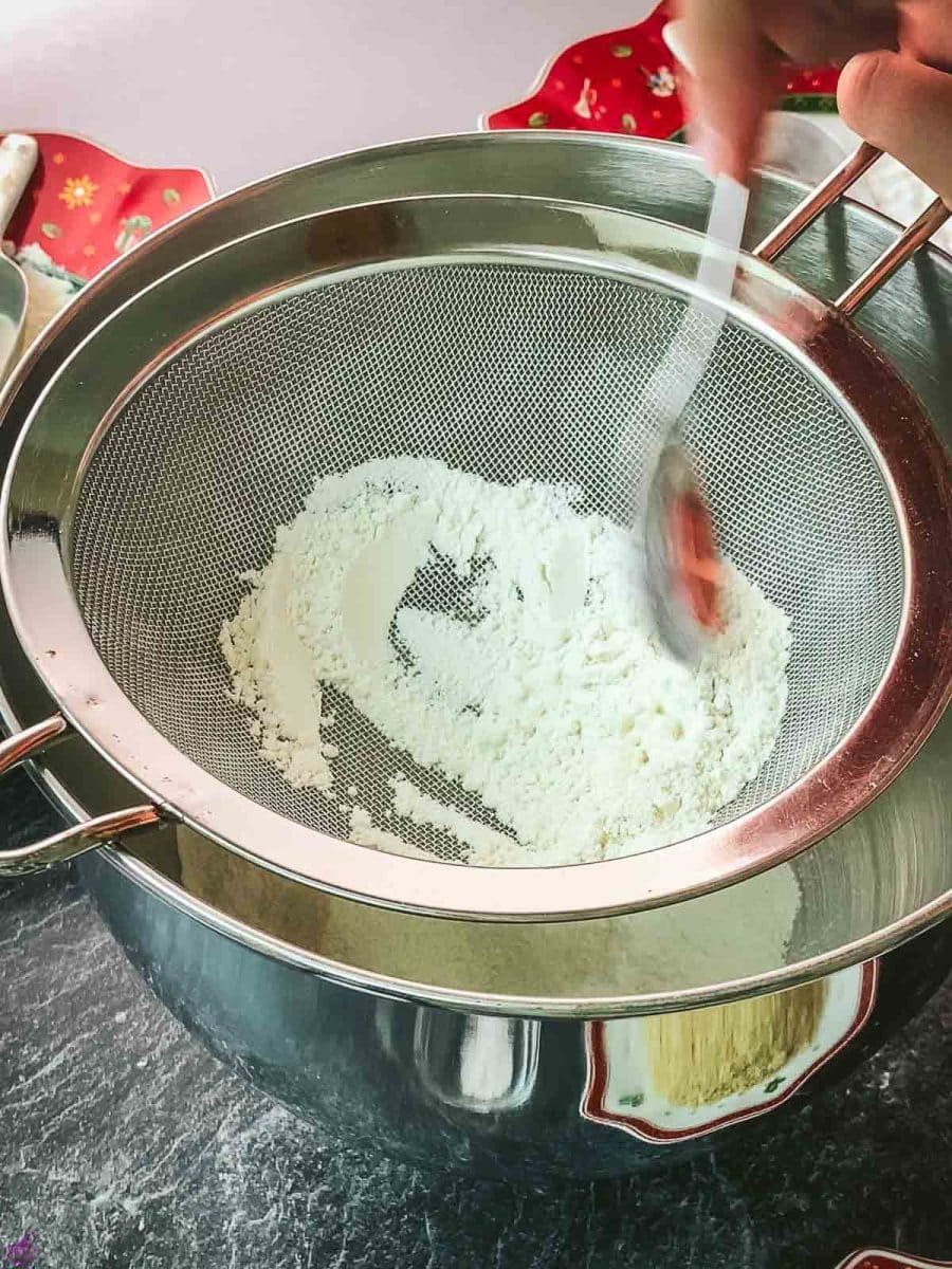 Sift the flour and baking powder into a mixing bowl.