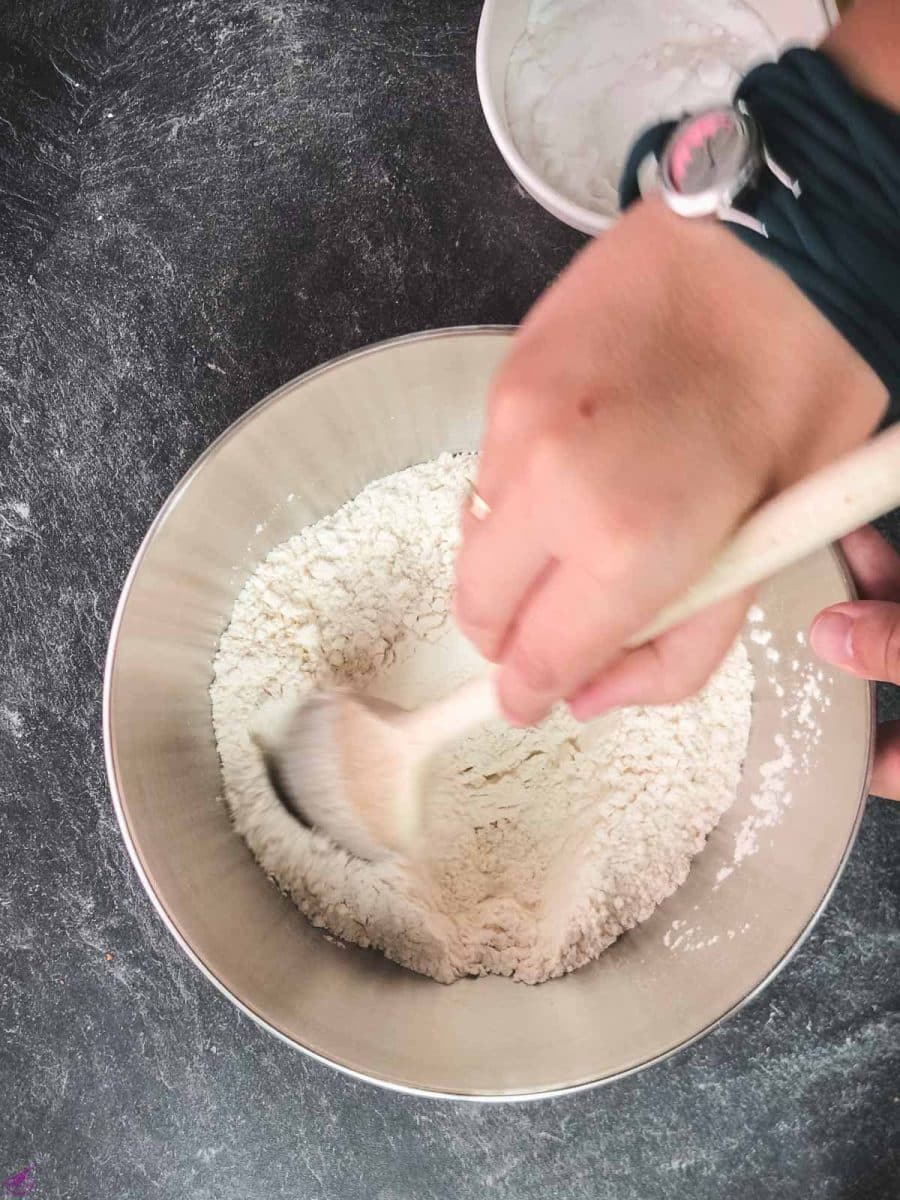 Create a dry mix by combining flour, salt, baking soda, and baking powder.