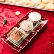 Three beginner-friendly chocolate dips that only require five simple ingredients. Piped in small gorgeous Christmas dipping bowls.
