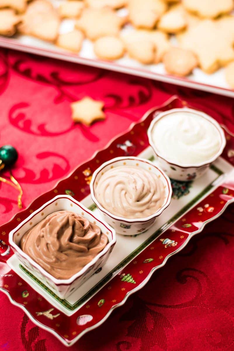 Three beginner-friendly chocolate dips that only require five simple ingredients. Piped in small gorgeous Christmas dipping bowls.