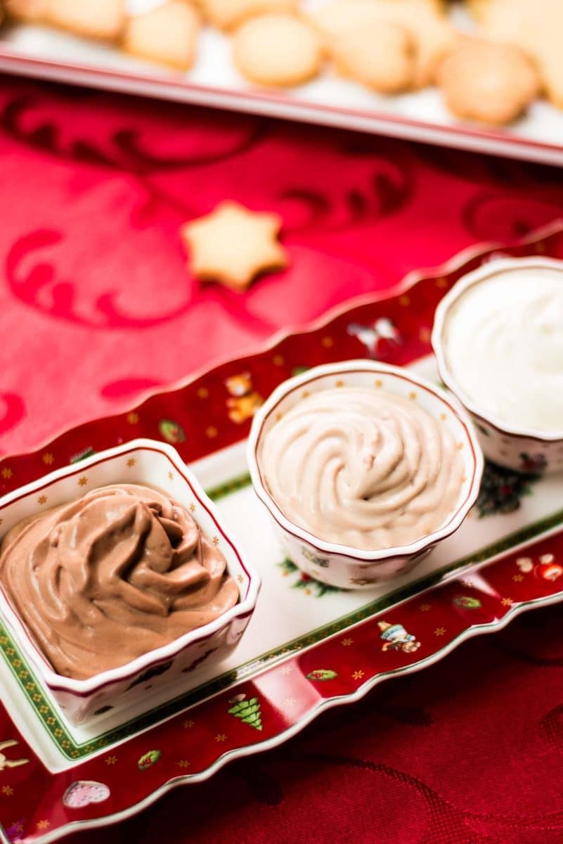 Three beginner-friendly chocolate dips that only require five simple ingredients. Piped in small gorgeous Christmas dipping bowls.