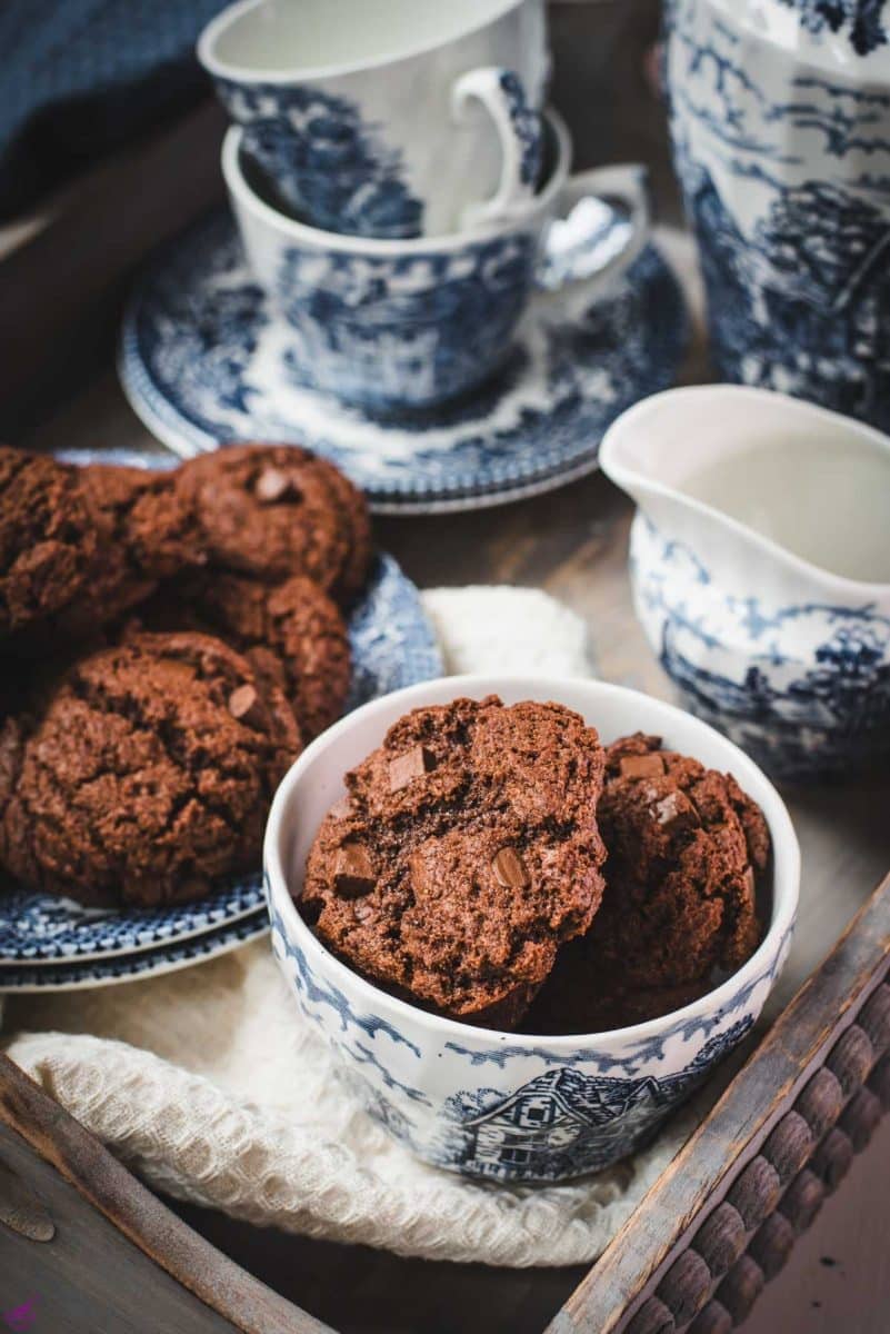 Beautiful coffee chocolate chip cookies, on blue white porcelain.