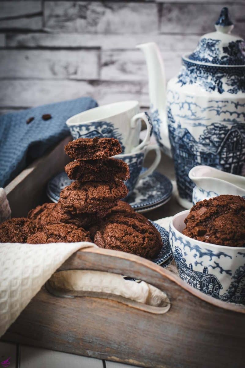 Beautiful coffee chocolate chip cookies, on blue white porcelain.