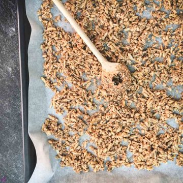 Spread the mixture on a lined baking sheet and bake.