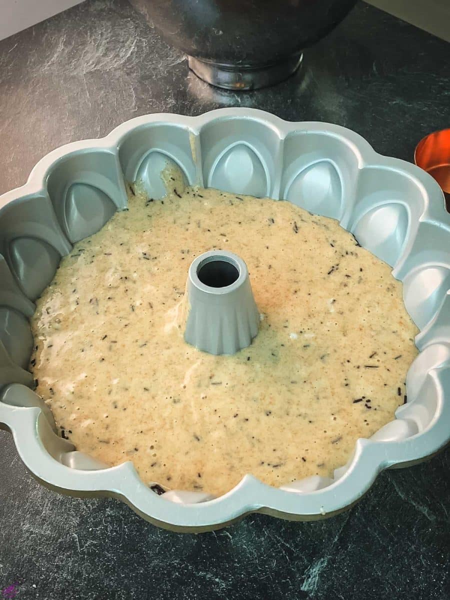 With cake batter filled bundt cake pan.