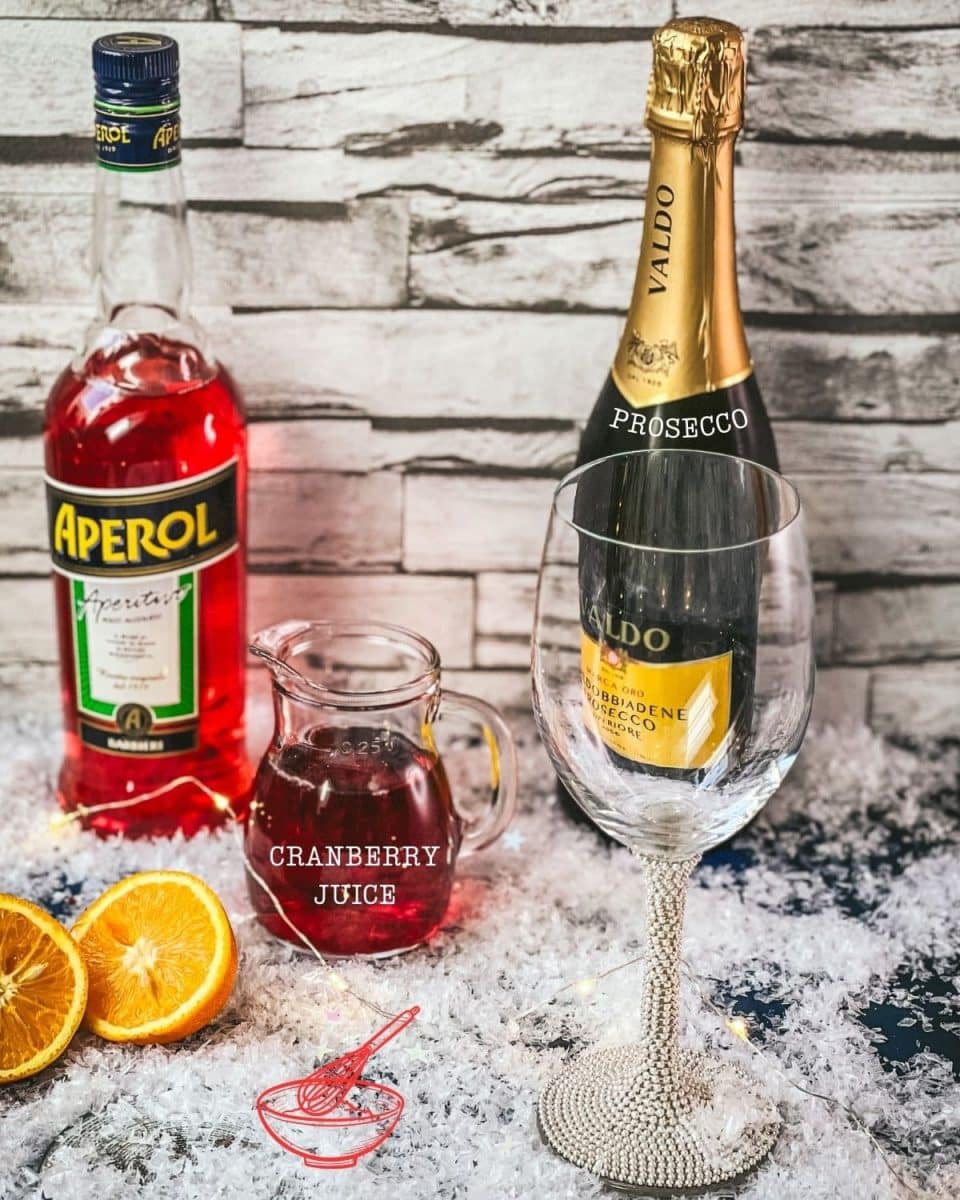 Three ingredients are required for making a Winter Aperol Spritz - Aperol, cranberry juice and prosecco.