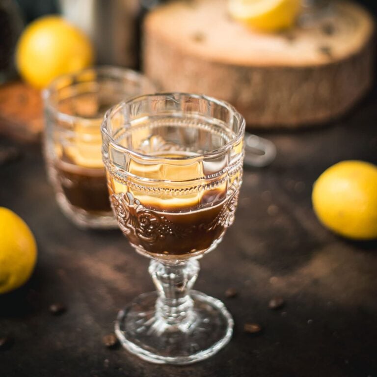 Two glasses filled with delicious coffee romano.