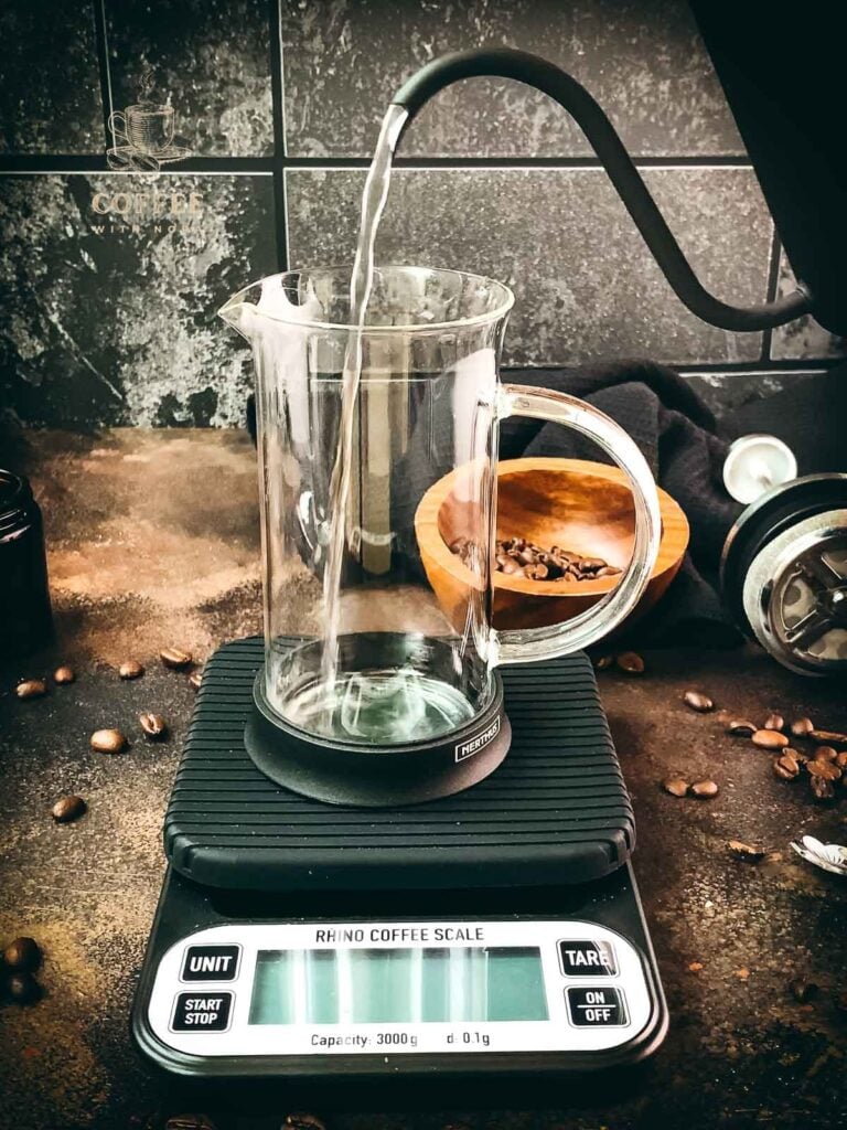 Rinse the French press with hot water to preheat it.