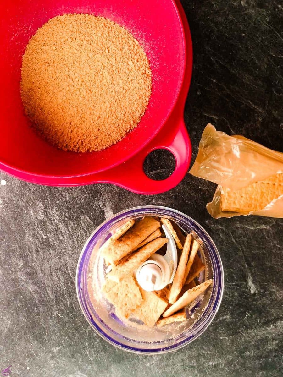 Crush the graham cracker sheets with a food processor into little crumbs.