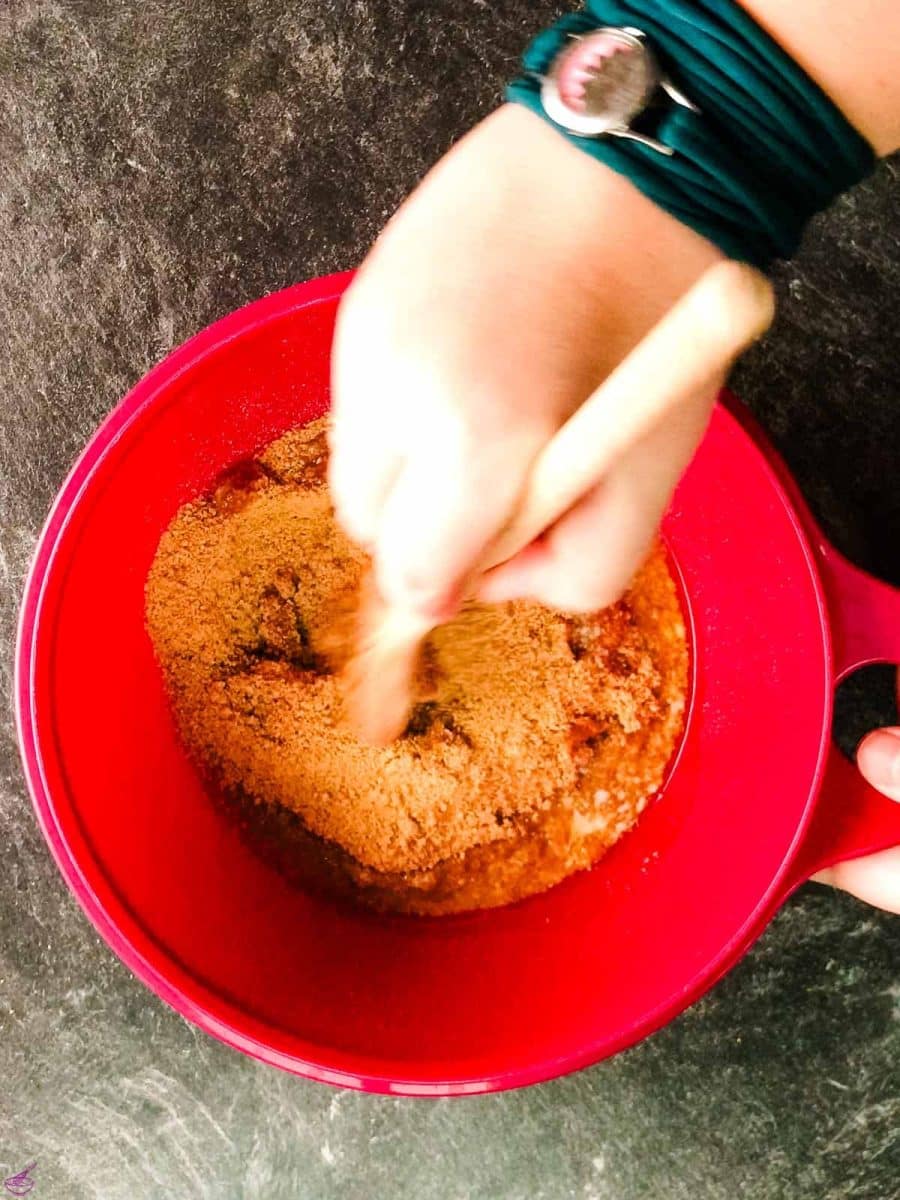 Mix the graham cracker crumbs with the melted butter in a mixing bowl.