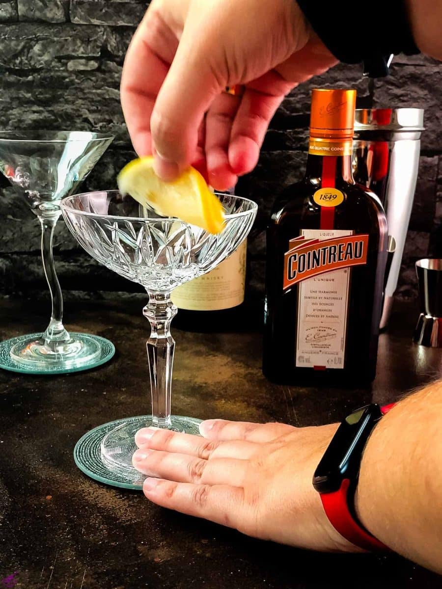 Run a lemon wedge along the rim of your cocktail glass.