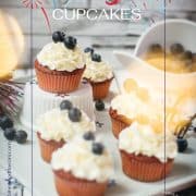 Gorgeous red, white and blue cupcakes, placed on white plate.