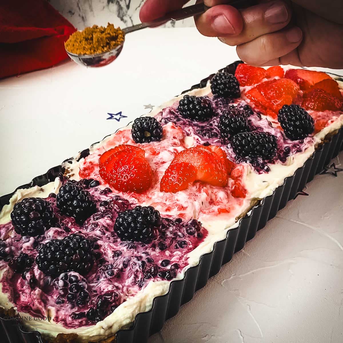 Sprinkle lotus Biscoff cookie crumbs on top of the 4th of July tart.