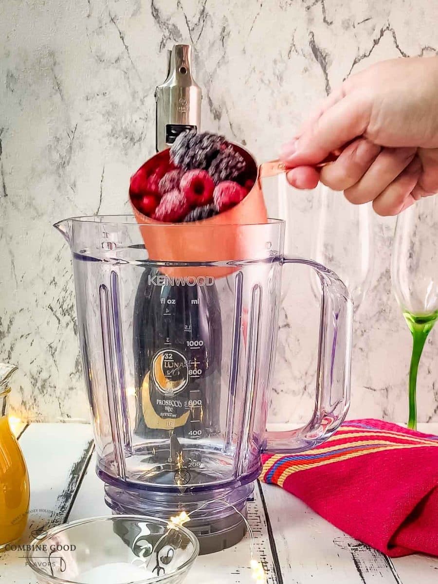 Add the berry mix to the blender.