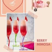 Gorgeous colored champagne flutes filled with vibrant berry mimosa.