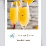 Gorgeous mimosa, garnished with orange slice in cute glass with small gems.