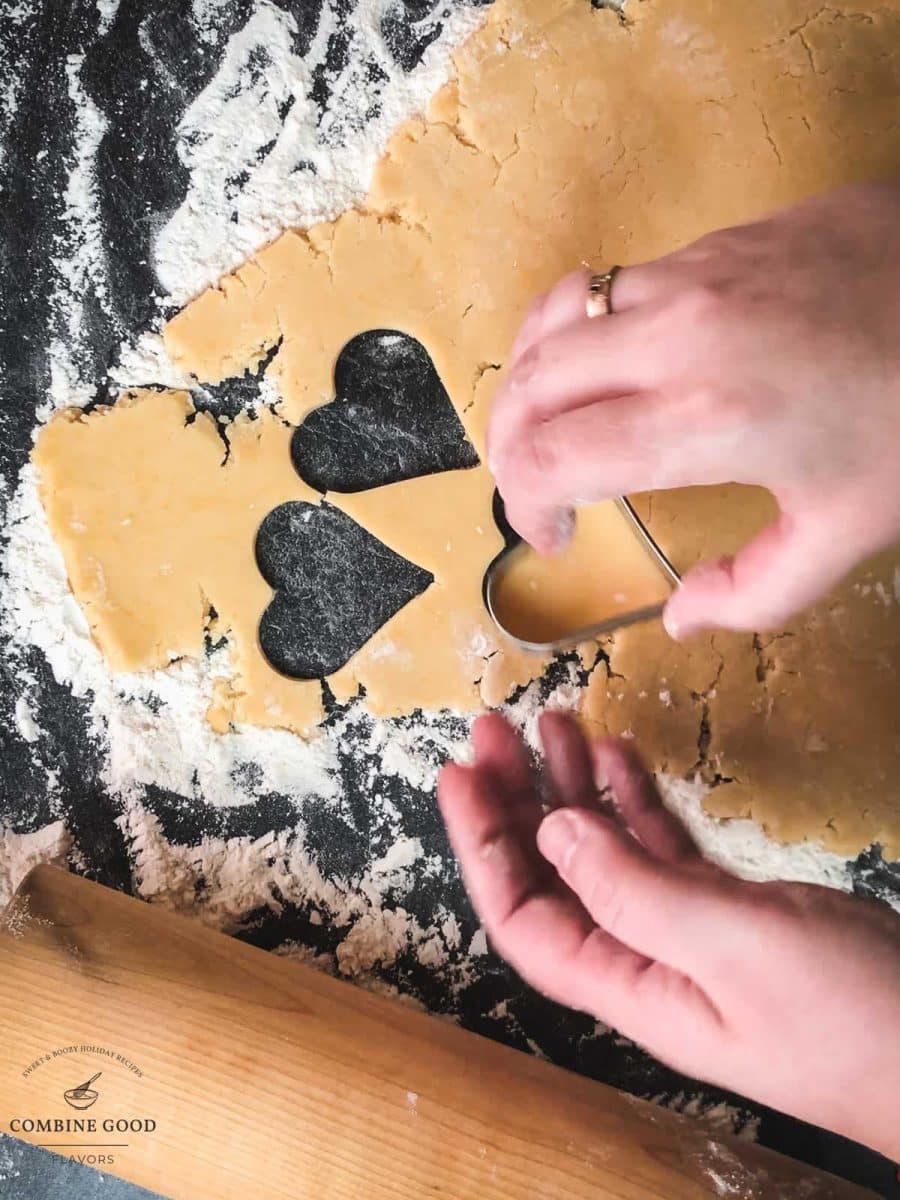 Cut out the heart shaped cookies using different cookie cutter sizes.