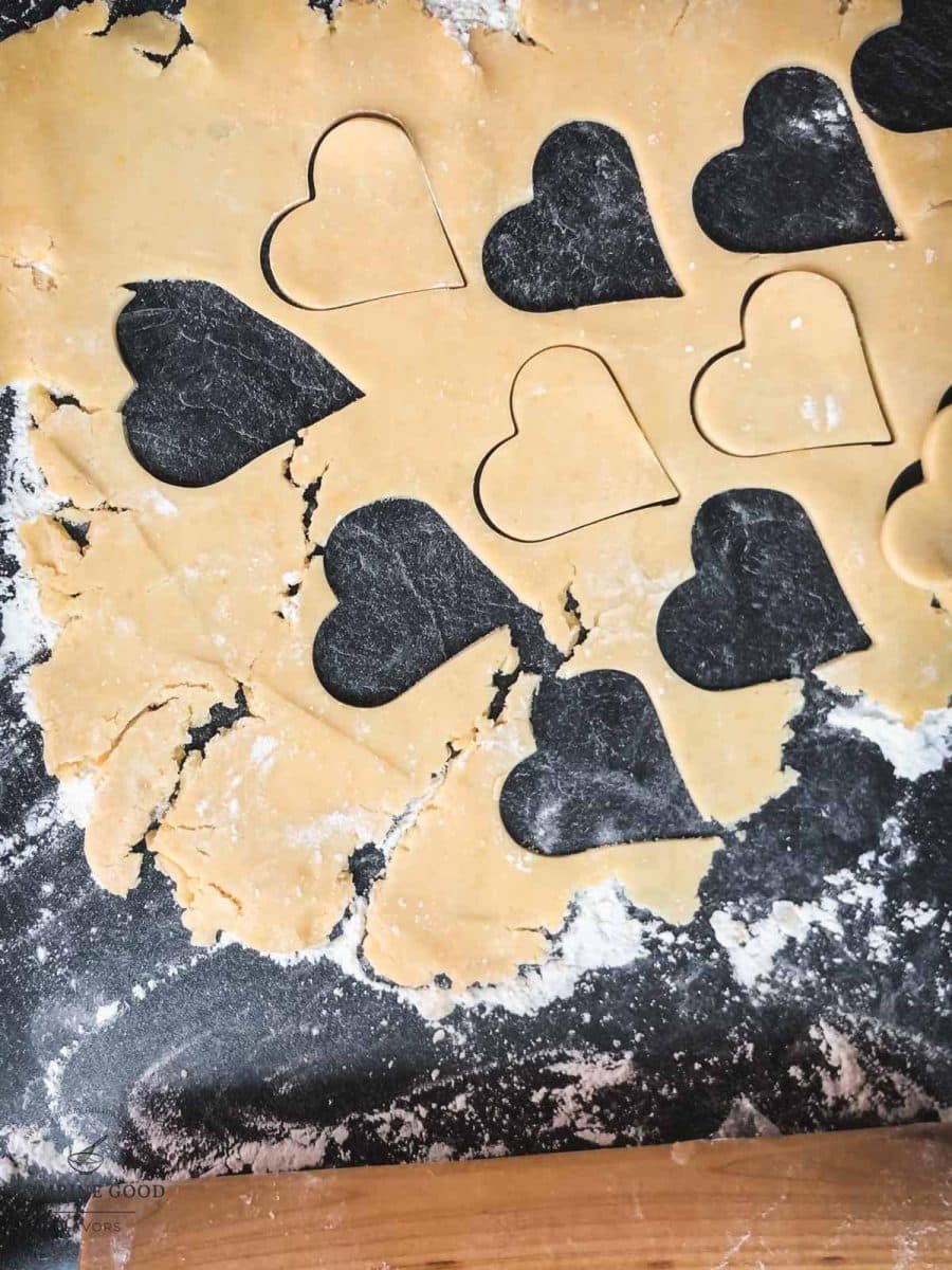 Cut out the heart shaped cookies using different cookie cutter sizes.